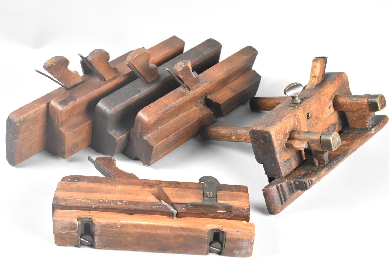 A Collection of Seven Vintage Various Wooden Moulding Planes