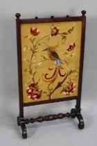 A Late 19th Century Mahogany Framed Silk Embroidered Fire Screen Depicting Exotic Bird in Branch,