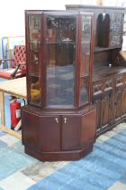 A Turnidge Corner Display Cabinet of Canted Form with Cupboard Base