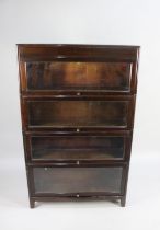 A Mid 20th Century "Angus" Four Tier Bookcase with Glazed Up and Over Doors, 86cms Wide by 25cms