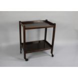 A Mid 20th Century Two Tier Oak Tea Trolley with Galleried Top and Stretcher Shelf, 65cms Wide
