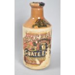 An Unopened Stoneware Bottle Containing Blackfriars Black Grate Enamel