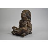 A Cast Resin Study of Seated American Indian Chief with Feather Headdress, 30cms High
