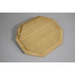 A Carved Oak Octagonal "Mouseman" Cheeseboard with Mouse