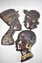 A Collection of Three Wall Hanging African Plaques, Tallest 38cms