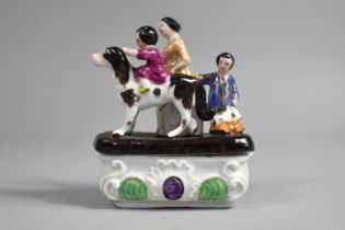 A Late 19th Century Continental Fairing depicting Queen Victoria with Children and Dogs, 8cms Wide
