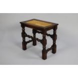 A Mid 20th Century Rectangular Stool with Barley Twist Side Stretchers and Cane Panel to Top,