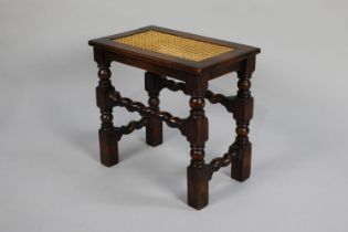 A Mid 20th Century Rectangular Stool with Barley Twist Side Stretchers and Cane Panel to Top,