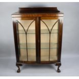 A Mid 20th Century Mahogany Bow Fronted Display Cabinet with Two Glass Shelves and Galleried Back,