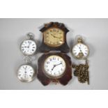 A Collection of Two Travel Clocks, Three Pocket Watches and a Watch Chain