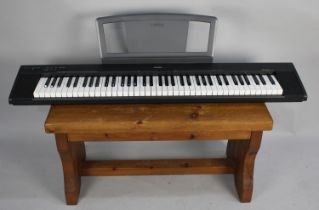 A Yamaha Portable Grand NP-30 Electric Keyboard (No Power Cable or Stand and Table Not Included)