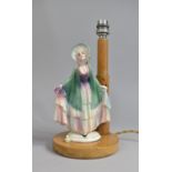 A Mid 20th Century Figural Table Lamp, Ceramic Lady on Wooden Lamp Base with Stepped Lamp Support,
