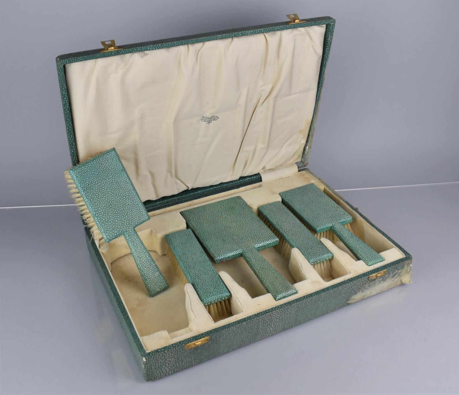 An Art Deco Cased Shagreen Dressing Table Set with Pair of Hair Brushes, Pair Clothes Brushes and