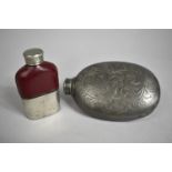 Two Hip Flasks, Larger being a Pewter Example with Scrolled Decoration, Smaller with Leather top