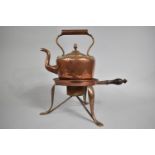 A 19th century Copper Kettle with Acorn Finials together with a Copper Stand with Turned Wooden