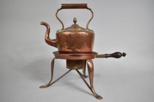 A 19th century Copper Kettle with Acorn Finials together with a Copper Stand with Turned Wooden