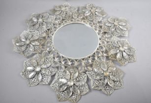 A Circular Metal and Perspex Wall Mirror in the Form of Flower Petals, 55cms Diameter