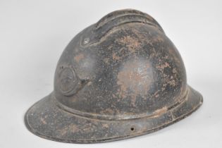 A French Adrian Military Helmet with RF Badge and Top Comb, Leather Interior