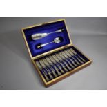 An Edwardian Mahogany Canteen Containing 12 Silver Plated Fish Knives and Forks and Pair of Servers,