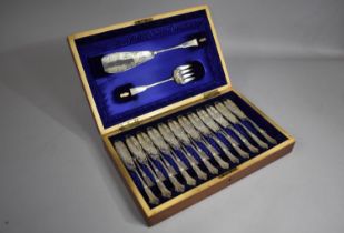 An Edwardian Mahogany Canteen Containing 12 Silver Plated Fish Knives and Forks and Pair of Servers,