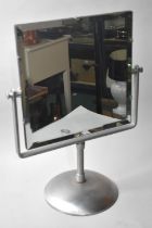 A Mid 20th Century Heavy Metal Framed Bevel Edged Swing Bathroom Mirror, 49cms High and 37cms Wide