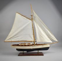 A Nicely Made Table Top Model of a Sailing Boat, Fully Rigged and In Full Sail, 65cms Wide and 70cms