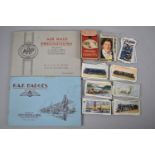 A Small Collection of Loose Cigarette Cards, together with two albums, RAF Badges and Air Raid