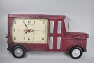 A Modern Novelty 'Retro' Wall Clock in the form of a Vintage Car