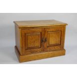 A Mid 20th Century Oak Cupboard with Panelled Doors to Shelved Interior, 72cms Wide and 50cms High