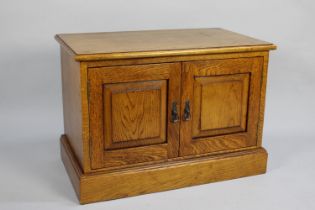 A Mid 20th Century Oak Cupboard with Panelled Doors to Shelved Interior, 72cms Wide and 50cms High