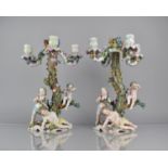 A Pair of German Porcelain Four Branch Figural Candelabra in the Form of Encrusted Tree with Three