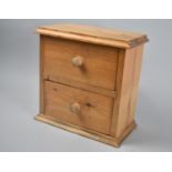 A Modern Pine Two Drawer Chest, 24cms Wide