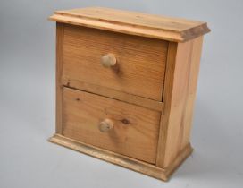 A Modern Pine Two Drawer Chest, 24cms Wide