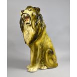 A Large Plaster Study of a Seated Lion, 58cms High