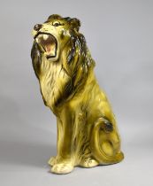 A Large Plaster Study of a Seated Lion, 58cms High