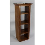 A Mid 20th Century Narrow Oak Bookcase with Three Adjustable Shelves and Galleried Back, 44cms
