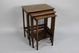 A Nest of Three Mid 20th Century Oak Rectangular Topped Tables, 47cms Wide