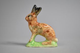 A Spongeware Decorated Study of Seated Rabbit, 10cms High