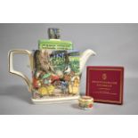 A Novelty Wind in The Willows Teapot by James Sadler together with a Small Enamel Circular Box by