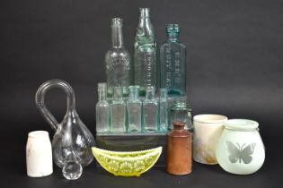 A Collection of Various Glass and Stoneware Bottles Etc