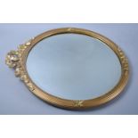 A Mid 20th Century Circular Gilt Framed Wall Mirror with Wreath and Swag Gilded Decoration, 45cms