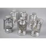 A Collection of Six Various Mid 20th Century Metal Hurricane Lamps, Each 26cms High