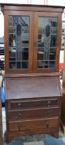 A Mid 20th Century Bureau Bookcase with Pull Down Front to Fitted Interior over Three Long
