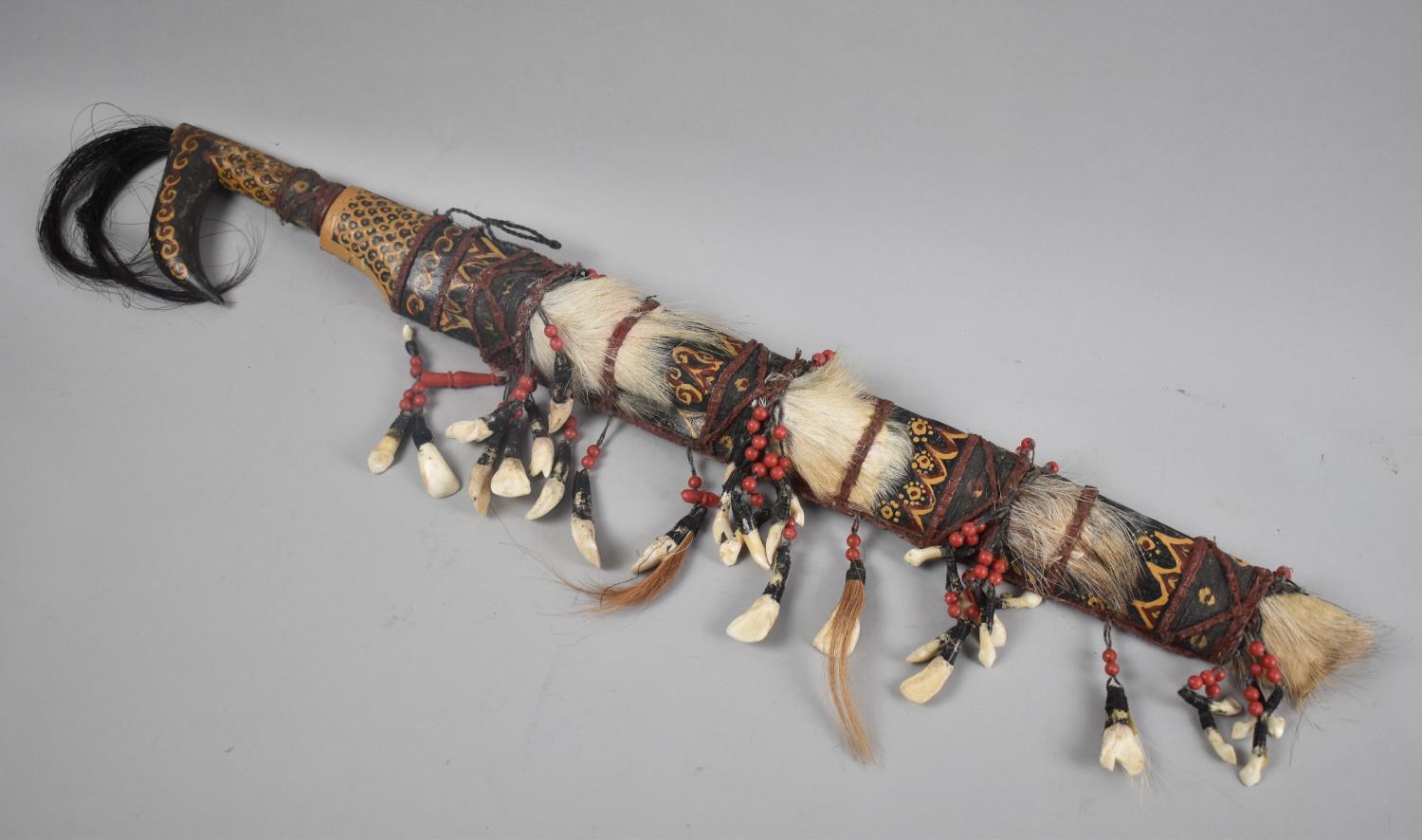A Souvenir African Tribal Sword Decorated with Seashells, Animal Skin and Beads, Missing Dagger,
