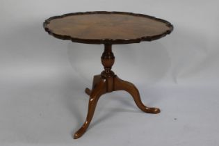 A Mid 20th Century Walnut Snap Top Tripod Coffee Table with Piecrust Border, 60cms Diameter