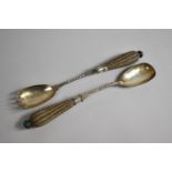 A Pair of Silver Plated Salad Servers with Doulton on Lambeth Stoneware Handles Decorated in The