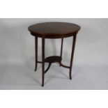 An Edwardian String Inlaid Mahogany Occasional Table with Small Stretcher Shelf, 65cms Wide