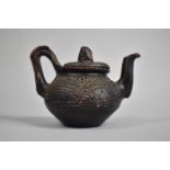 An Unusual Terracotta Teapot with Zoomorphic Spout and Loop Handle, 12cm high