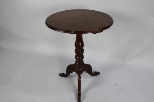 A Mahogany Circular Topped Tripod Table, 54cms Diameter