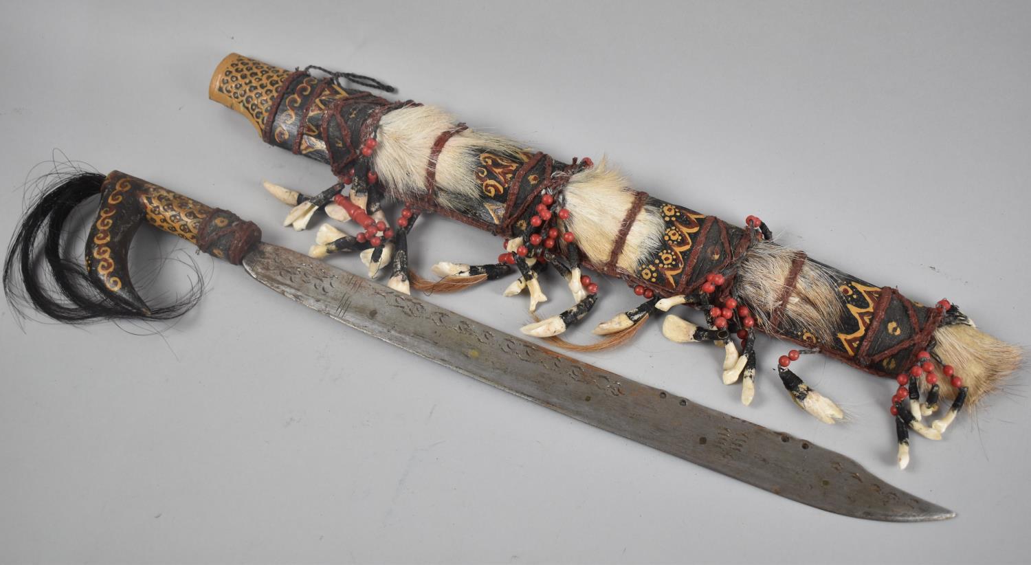 A Souvenir African Tribal Sword Decorated with Seashells, Animal Skin and Beads, Missing Dagger, - Image 2 of 3